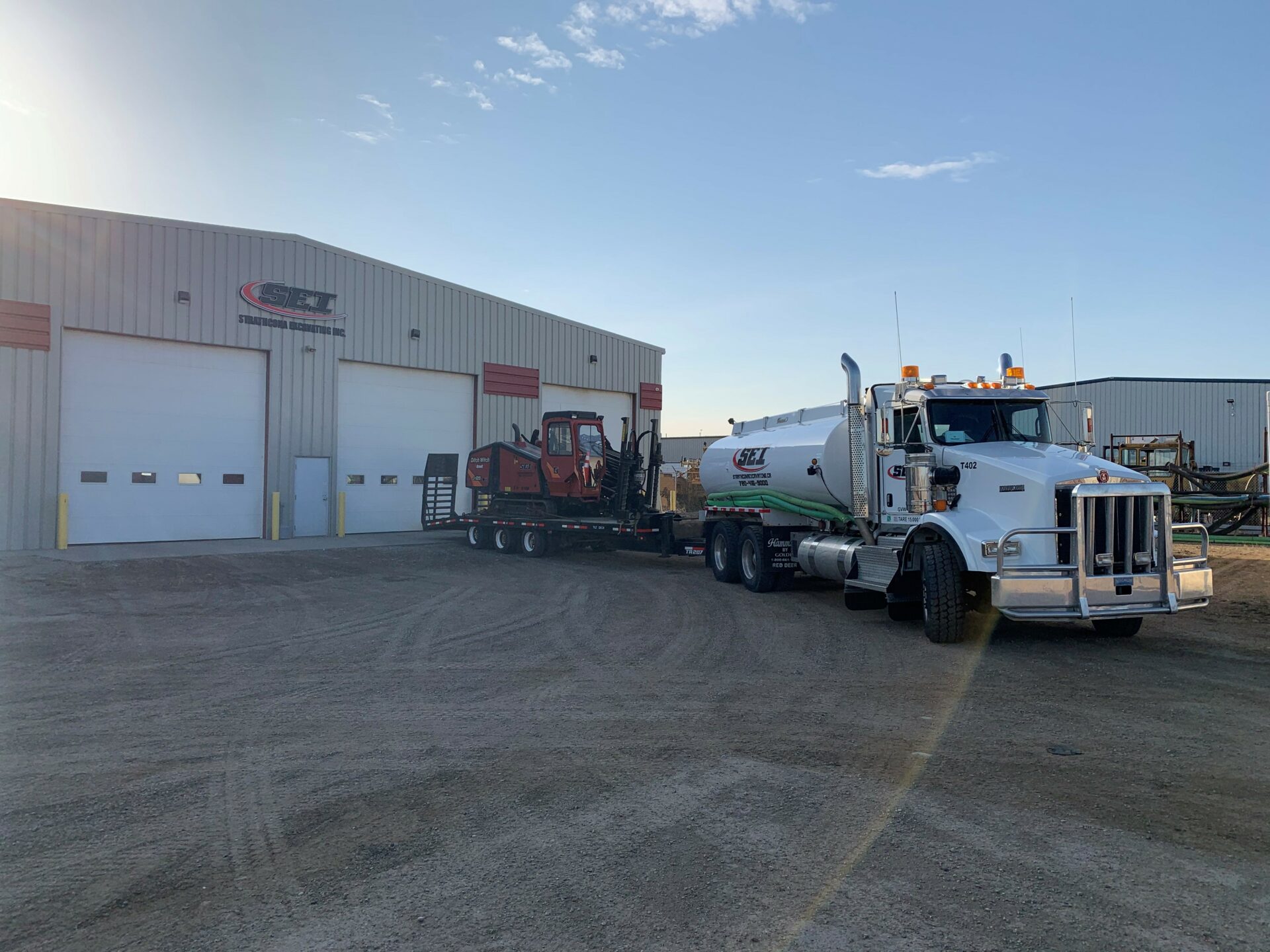 Water truck and ditch witch directional drilling in Alberta